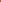 Close up of the rug edge with bold rust, brown, pink, and cream waves against a light wood floor