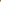 Earth tone rug beneath a chrome chair leg on a dark herringbone floor with warm circular color gradients