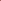 Irregular red pomegranate rug placed in front of low bed in loft-style room with rustic decor.