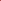 Heart-shaped section of red pop art bedroom rug with bold pink and red stripes near bed